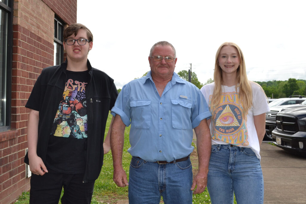 Pictured from left to right: PCHS junior Zach Riley, Perry County District Manager Mike Hickerson and junior Kari Byrd.